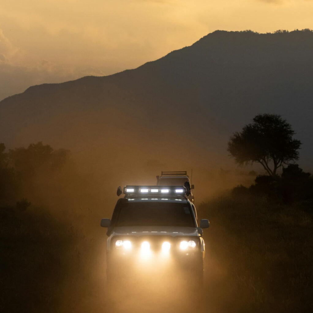 Preparing Your 4x4 for a safari with a 4x4 driving at night with bright headlights and light bar
